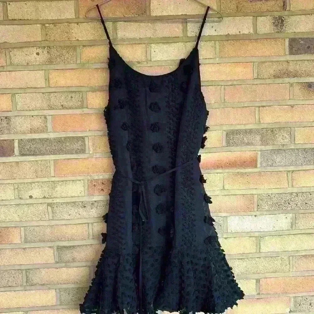 Anthropologie Entro Textured peplum style tie back mini dress L